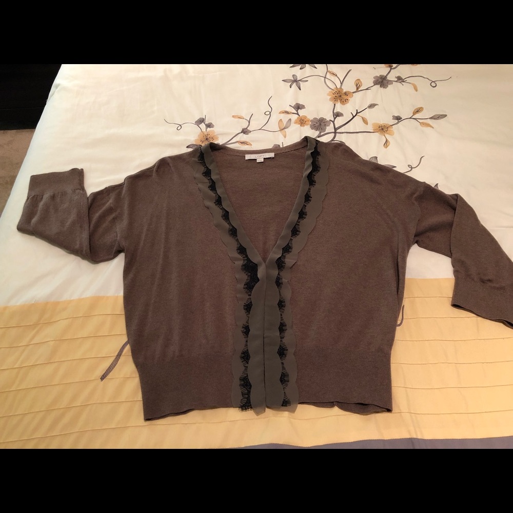 Two-Piece long-sleeved sweater top.